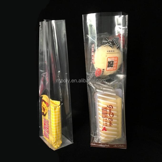 安いプラスチック パッキングの平底Oppはキャンデーのクッキーのパン屋のチェロのギフト袋のための御馳走パーティの記念品袋を袋に入れる